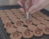 A picture of step 14 of PARISIAN MACARONS (chocolate macarons).
