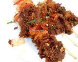 A picture of step 7 of Tsire Skewers.
