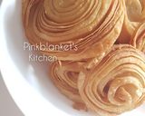 A picture of step 11 of Flaky Spiral Curry Puffs.
