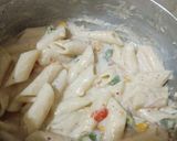 A picture of step 12 of White sauce Pasta.