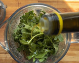 A picture of step 4 of Pasta with Arugula Pesto.