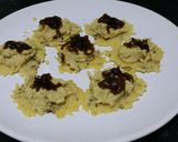A picture of step 7 of Crispy Parmesan Canapés with Hummus and Caramelized Onion Chutney.
