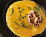 A picture of step 4 of California Farm Handmade Cottage Cheese Stuffed Omelette.