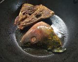 A picture of step 3 of Muri ghonto/Bengali fish head with rice.
