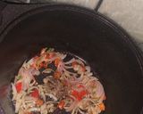 A picture of step 1 of Carrot rice.