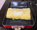 A picture of step 8 of Corn and Sausage Tamagoyaki.
