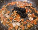 A picture of step 2 of Spaghetti with Squid Ink, Clams, and Pistachios.
