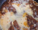 A picture of step 4 of Yam and Egg sauce.