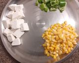 A picture of step 1 of Corn paneer capsicum curry.
