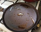 A picture of step 6 of Bhetki machher paturi/ Barramundi cooked in banana leaves.