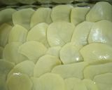 A picture of step 3 of Potato Parmigiana with Ham and Cheese.