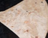 A picture of step 4 of Triangle chilli flakes parantha.