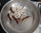 A picture of step 3 of Stuffed capsicums and tomatoes.