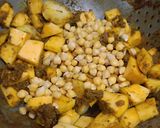 A picture of step 4 of Pumpkin and Chickpea Curry (with Mustard Spices).
