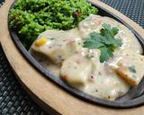 A picture of step 9 of Creamy Paneer with Spinach Rice.