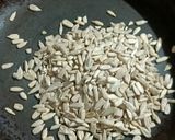A picture of step 1 of Sunflower Seeds Chikki.