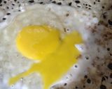 A picture of step 3 of Egg Dosa.