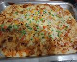 A picture of step 4 of Pita bread pizza.