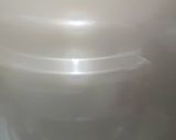 A picture of step 4 of Doodh daliya in pressure cooker (with different toppings).