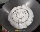 A picture of step 1 of Eggless Carrot Cake.