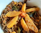 A picture of step 2 of Peels of raw banana with potato curry.