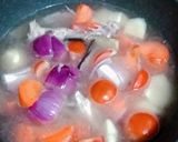 A picture of step 3 of 🍅 🥕 🥔 🐟 abc soup.