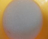 A picture of step 5 of Red valvet eggless cake in cooker.