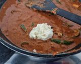 A picture of step 7 of Paneer cashew capsicum in curd based gravy.