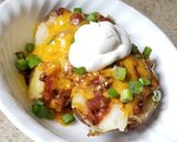 A picture of step 5 of Chili Cheese Baked Potatoes.