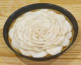 Foto del passaggio 4 della ricetta Crostata con zucca nocciole pere e cioccolato