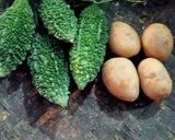 A picture of step 1 of आलू स्टफ्ड करेला (Aaloo stuffed karela recipe in hindi).
