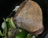 A picture of step 2 of Philly Cheesesteak Style French Dips.