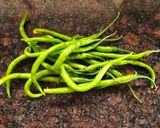 A picture of step 1 of Green Chilies Thecha.
