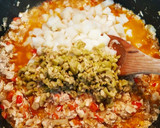Foto del paso 3 de la receta: Berenjenas horneadas con pollo y tomate