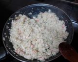 Foto del paso 3 de la receta: Pimientos del piquillo rellenos de merluza y palitos de cangrejo