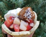 Foto del paso 8 de la receta: Florcitas rellenas de frutillas y peras