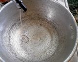 A picture of step 2 of Coconut rice.