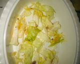 A picture of step 3 of Yam with chicken sauce.