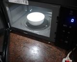 Foto del paso 3 de la receta: Copa doble mousse sobre base de galletas