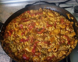 Foto del paso 7 de la receta: Paella de calamaritos y magro