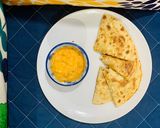 A picture of step 7 of Quesadilla (with few drops of oil and food turns delicious).