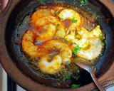 Foto del paso 3 de la receta: Langostinos con ajos, perejil y pulpa de pimientos choriceros