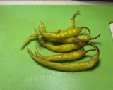 A picture of step 2 of Chicken Enchiladas with Pickled Peppers.