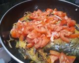 A picture of step 3 of Hilsa haldi pani.