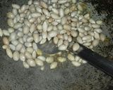 A picture of step 2 of Spicy Peanuts.