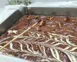A picture of step 4 of Marble and bounty fudge brownies.