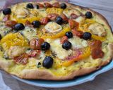 Une image de l'étape 6 de Pizza blanche au curry, tomates et emmental.