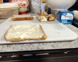 A picture of step 2 of Cinnamon and cream cheese roll ups.