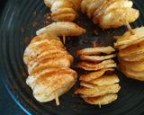 A picture of step 8 of Peri peri potato twist.