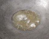 A picture of step 1 of Shimla mirchi besan sabzi.